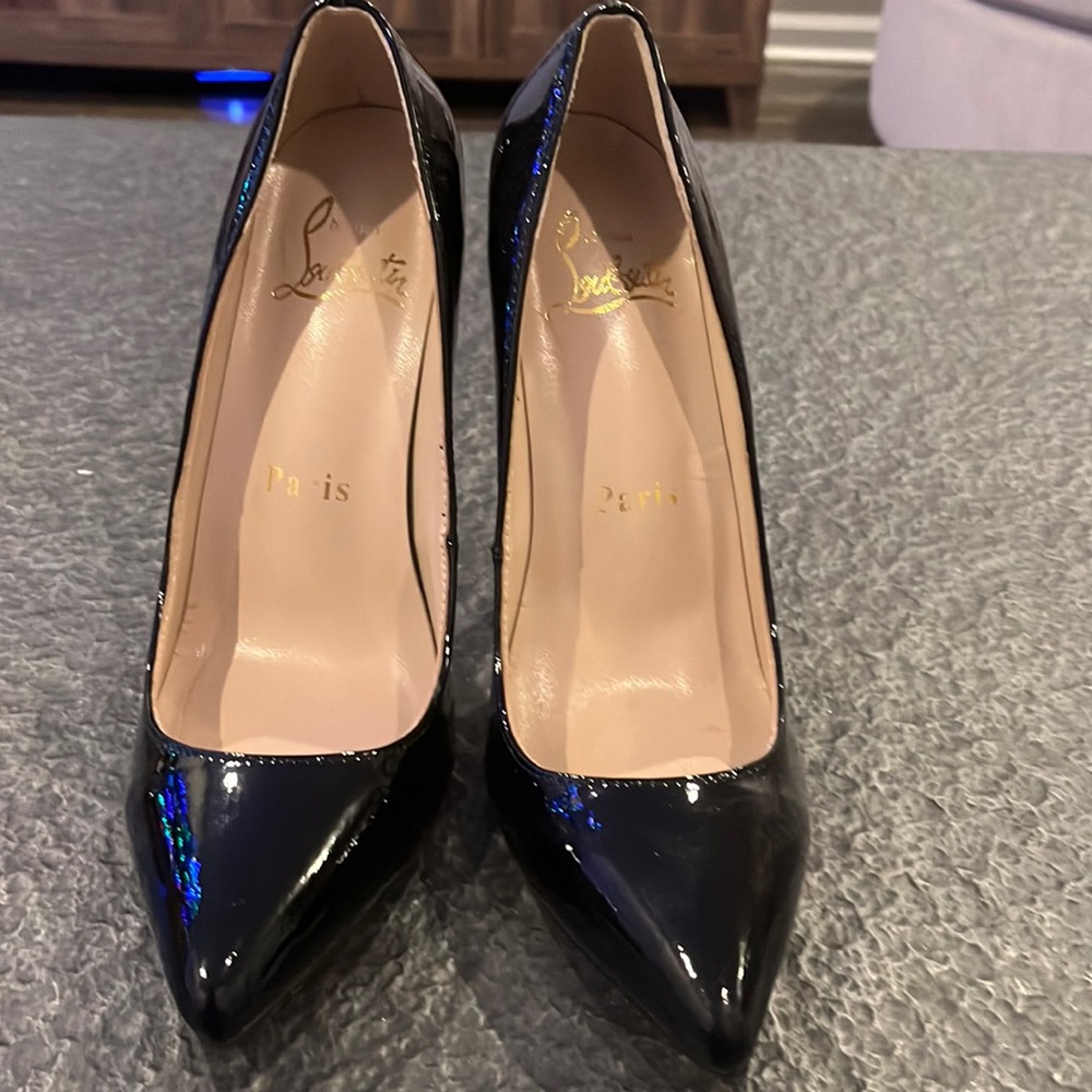 Black patent letter knock off Louboutin heels with red bottom. Size 38